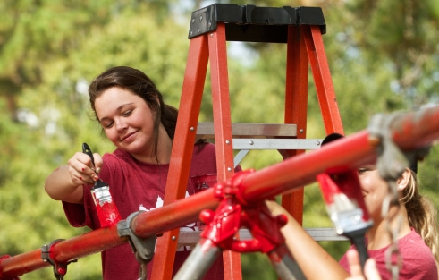 With over 20,000 community service hours, collegians learn value of working outside a 9-5 window